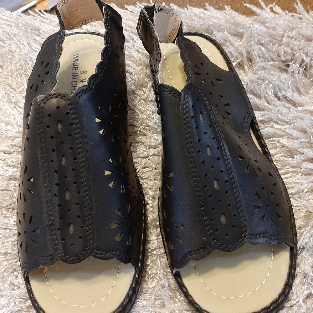 Black never worn sandals. Size 8.